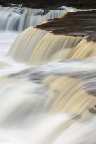 Abstract;Abstraction;Brown;Calm;Cascade;Cascading;Chute;Falling;Falls;Flow;Great Lakes;Healing;Health care;Healthcare;Line;Michigan;Nature;Pastoral;Pouring;Ripple;River;Rock;Rock formations;Rocky;Shape;Spilling;Stone;Stones;Stream;Streaming;Tan;United States;Upper Peninsular;Warm Colors;Warm Palette;Warm Tones;Water;Waterfalls;Waterscape;Yellow;color;flowing;landscape;oneness;orange;pattern;peaceful;rapids;reflection;reflections;restful;serene;soothing;tranquil;waterfall;yellow;zen